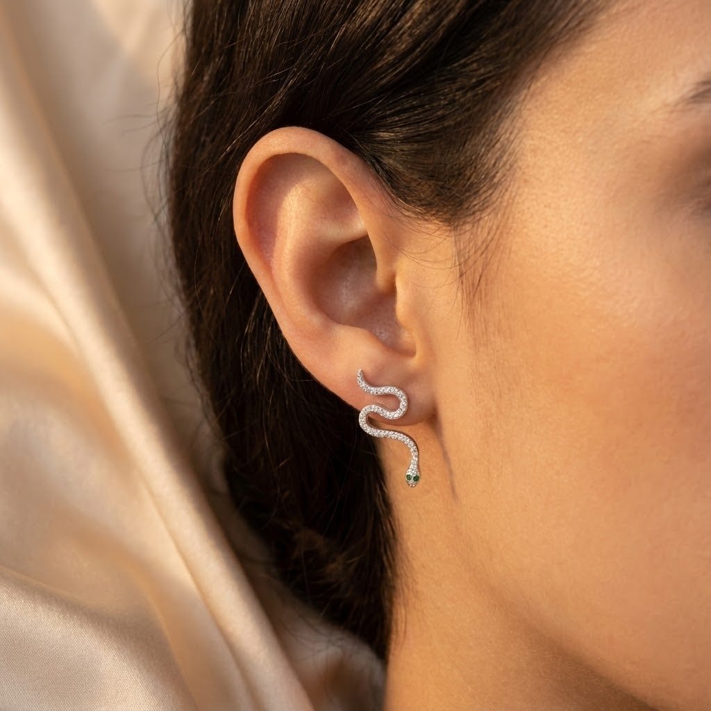 Brinco Cobra Olho Verde